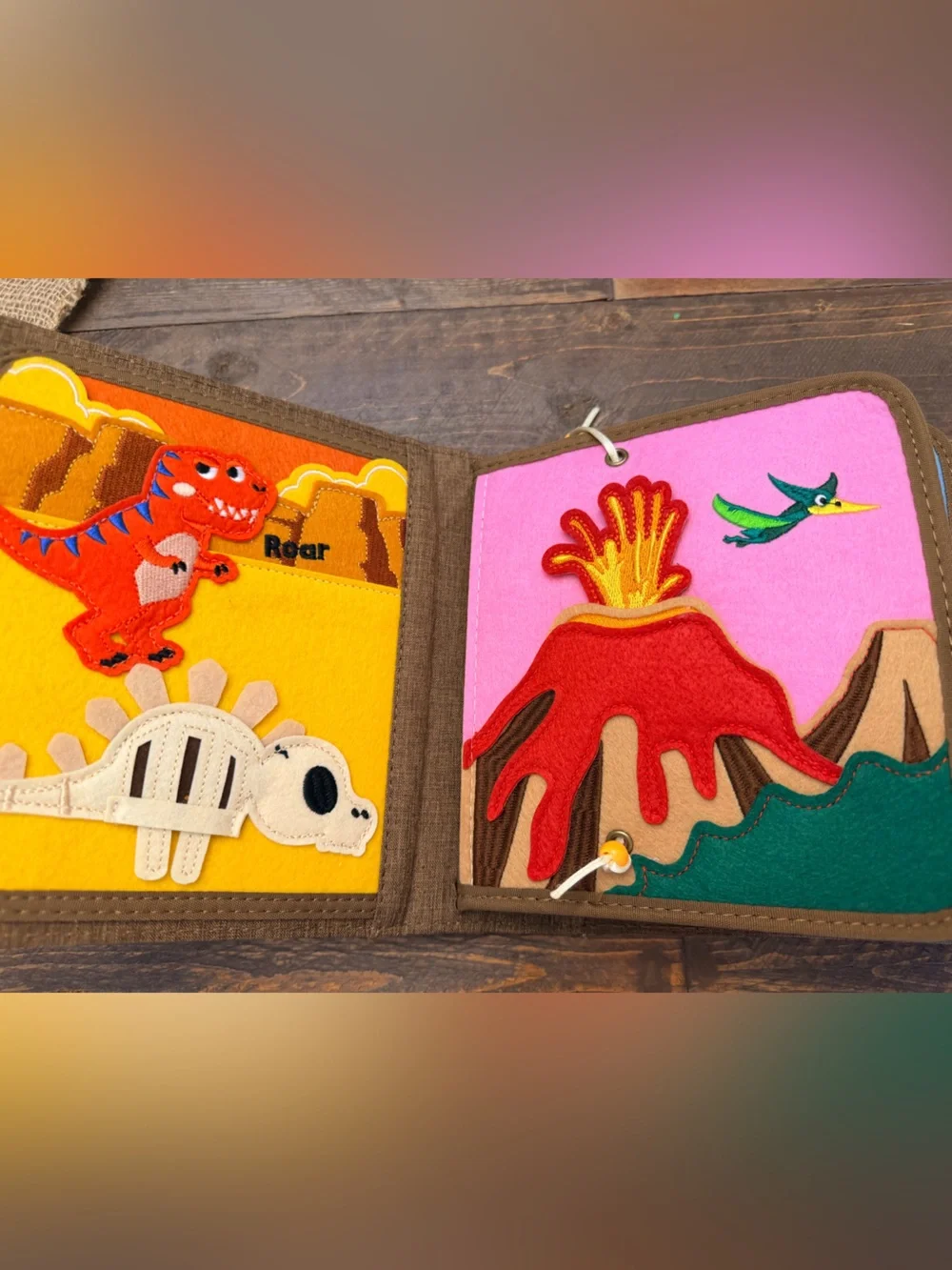 Pinkfong My First Book T-Rex, a Montessori-inspired interactive fabric busy book